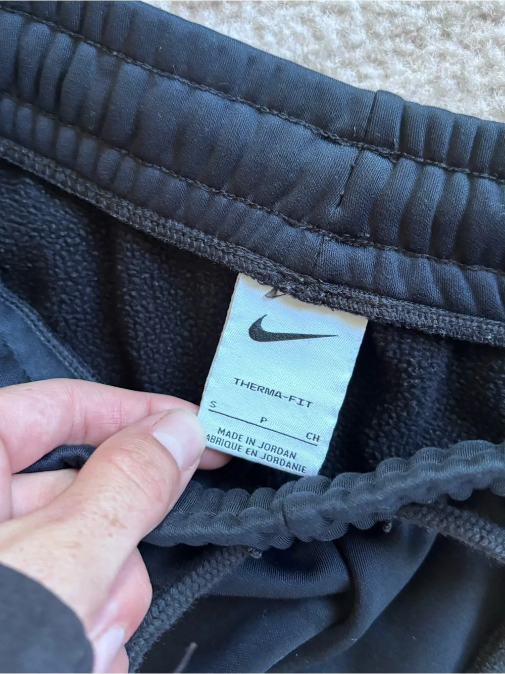 Nike Women’s Black sweatpants with White Swoosh